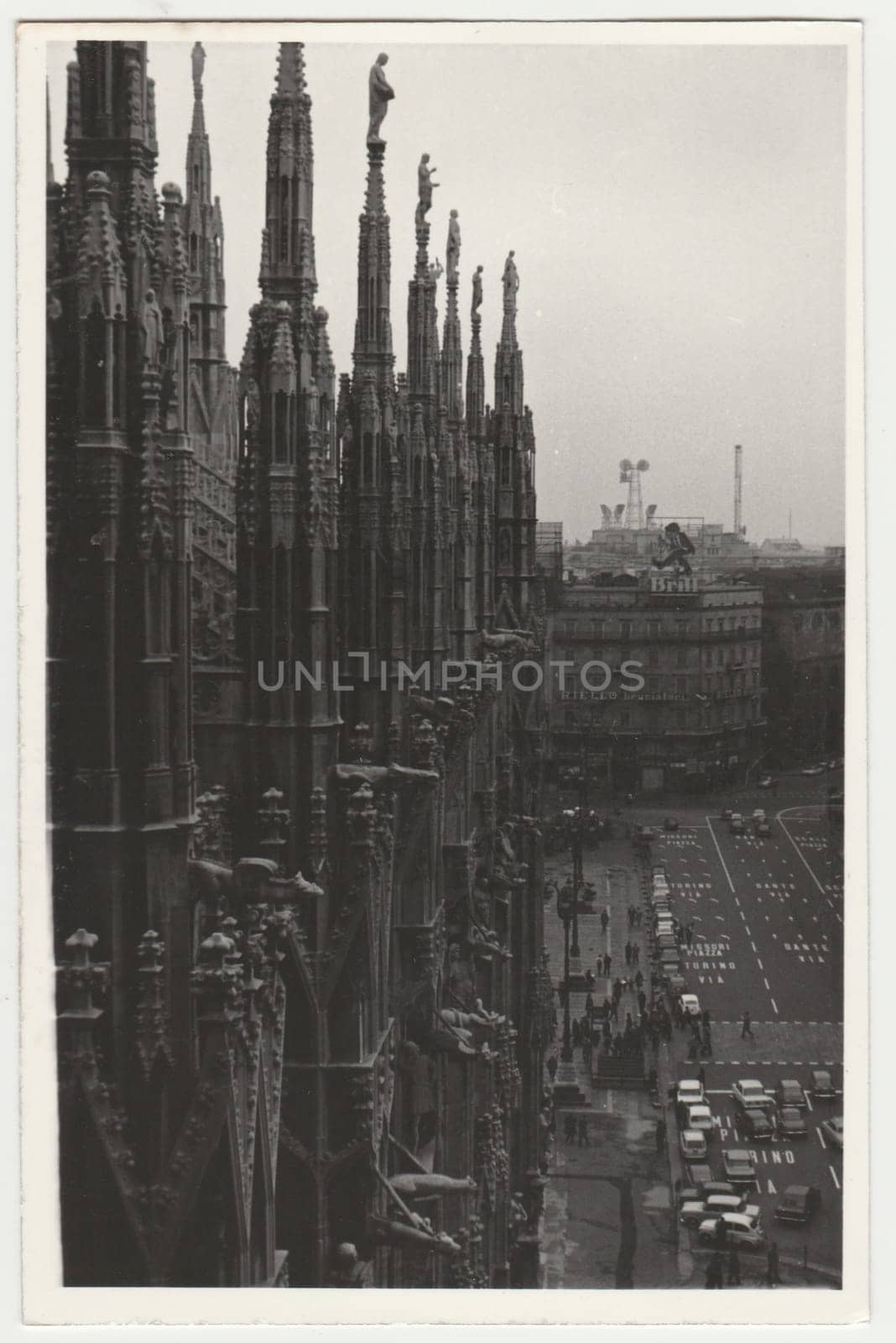 Vintage photo shows cathedral Il Duomo. Retro black and white photography. Circa 1970s. by roman_nerud