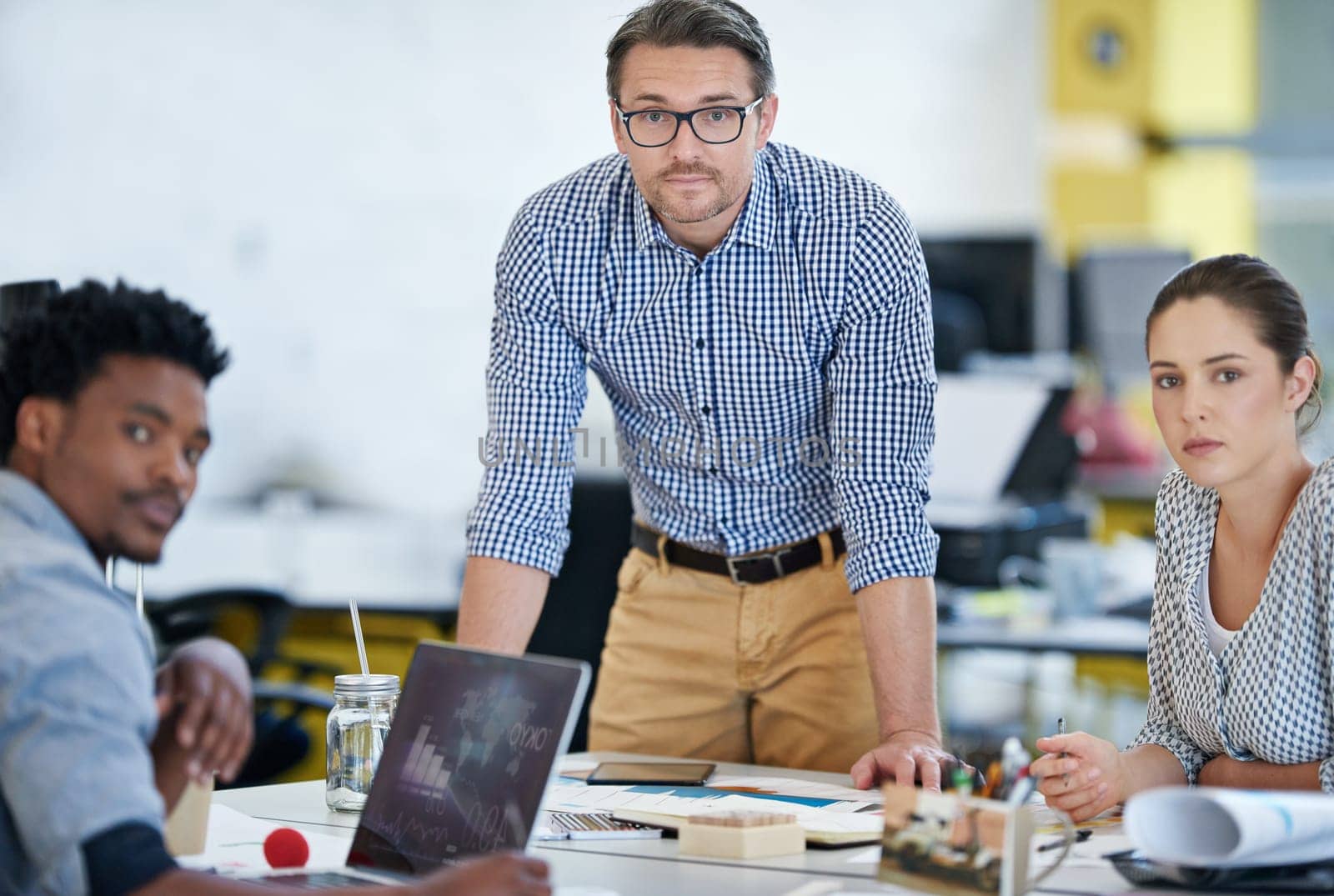 Modern professionals. Portrait of a diverse group of designers working together in an office