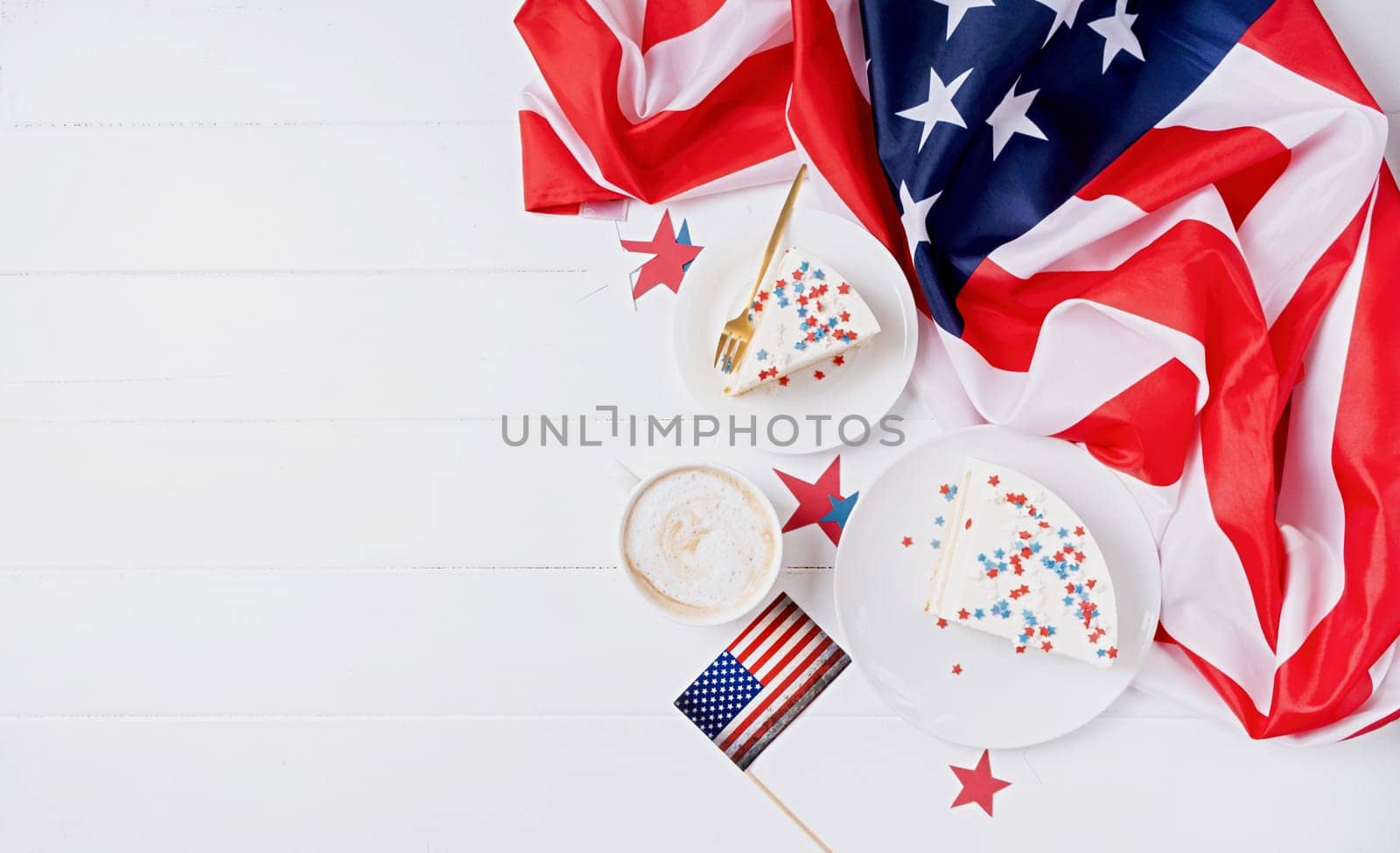 Fourth of july celebration. Sweet cake with usa flag colored sprinkles and stars , flag background top view flat lay