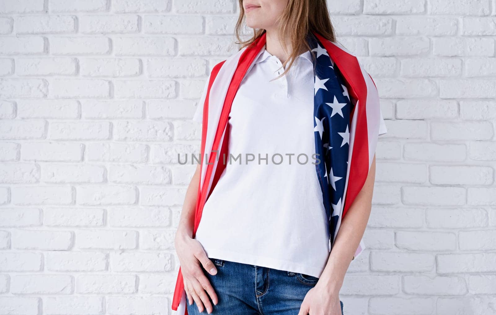 White polo shirt on woman over USA flag background, mockup design by Desperada