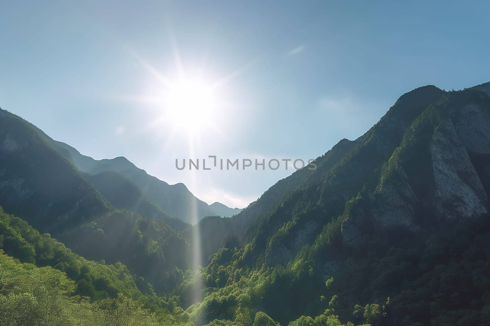 Beautiful sunrise over the green mountains in morning light with fluffy clouds on a bright blue sky. Nature freshness concept.