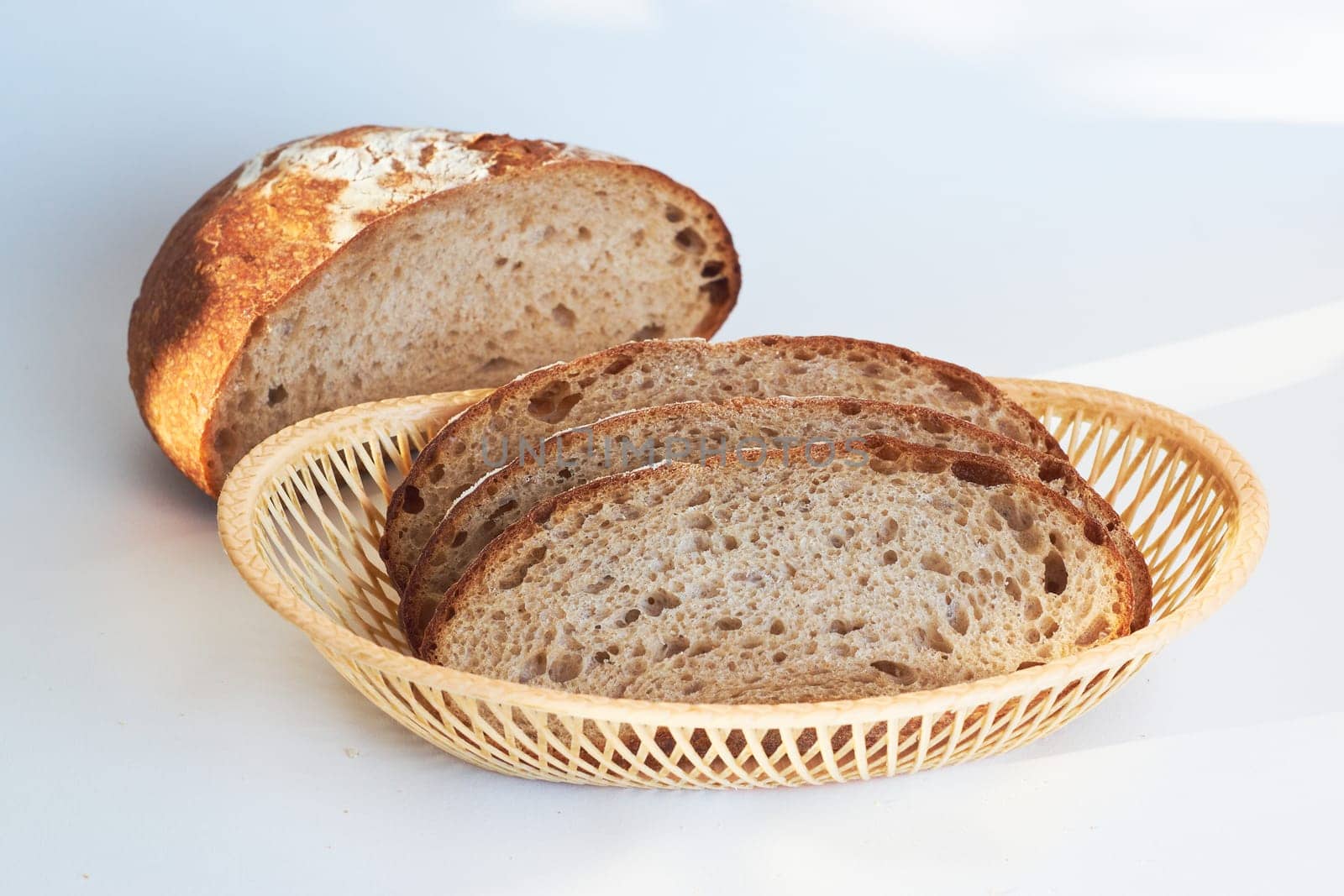 Sliced bread, on a white background. Slices of bread top view. by Севостьянов