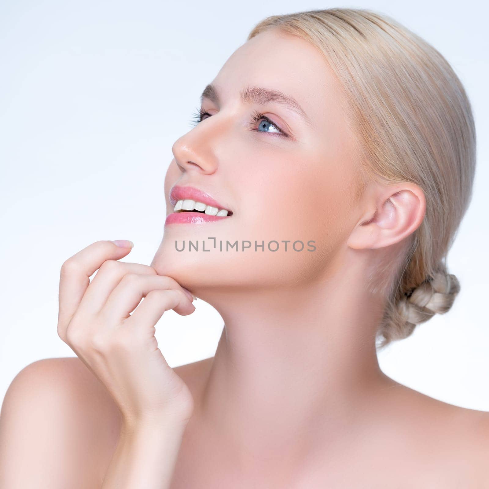 Closeup personable beautiful woman portrait with perfect smooth clean skin and natural makeup portrait in isolated background. Hand gesture with expressive facial expression for beauty model concept.