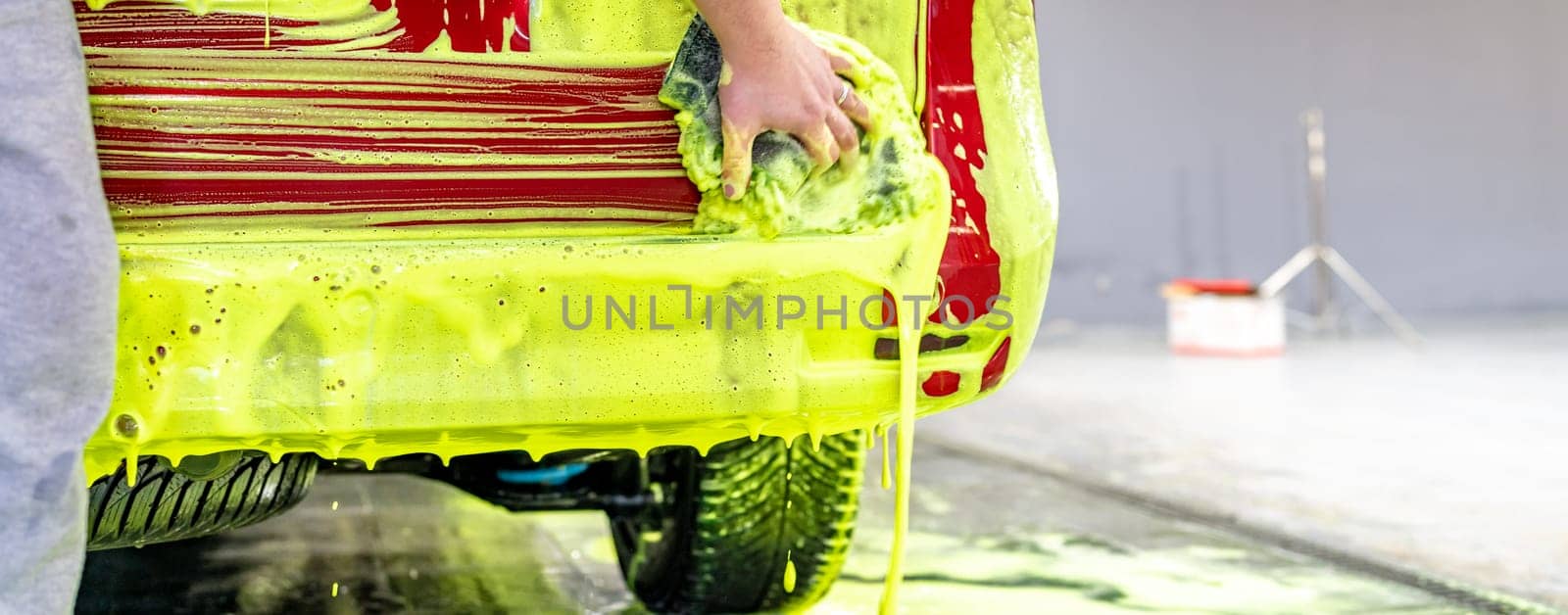 wash cars with green active foam in the garage by Edophoto