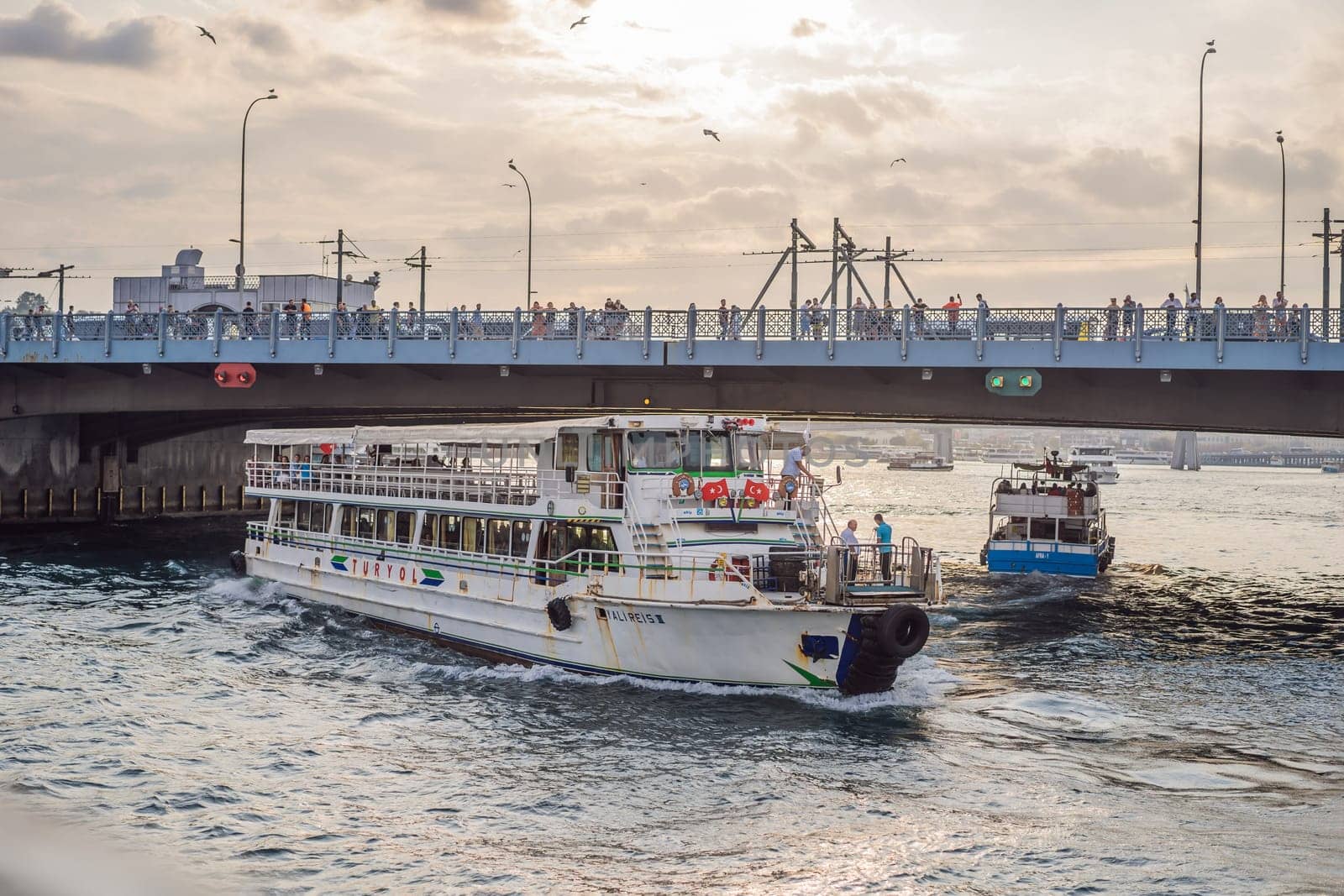 Istanbul, Turkey August 13, 2022: Muslim architecture and water transport in Turkey - Beautiful View touristic landmarks from sea voyage on Bosphorus.