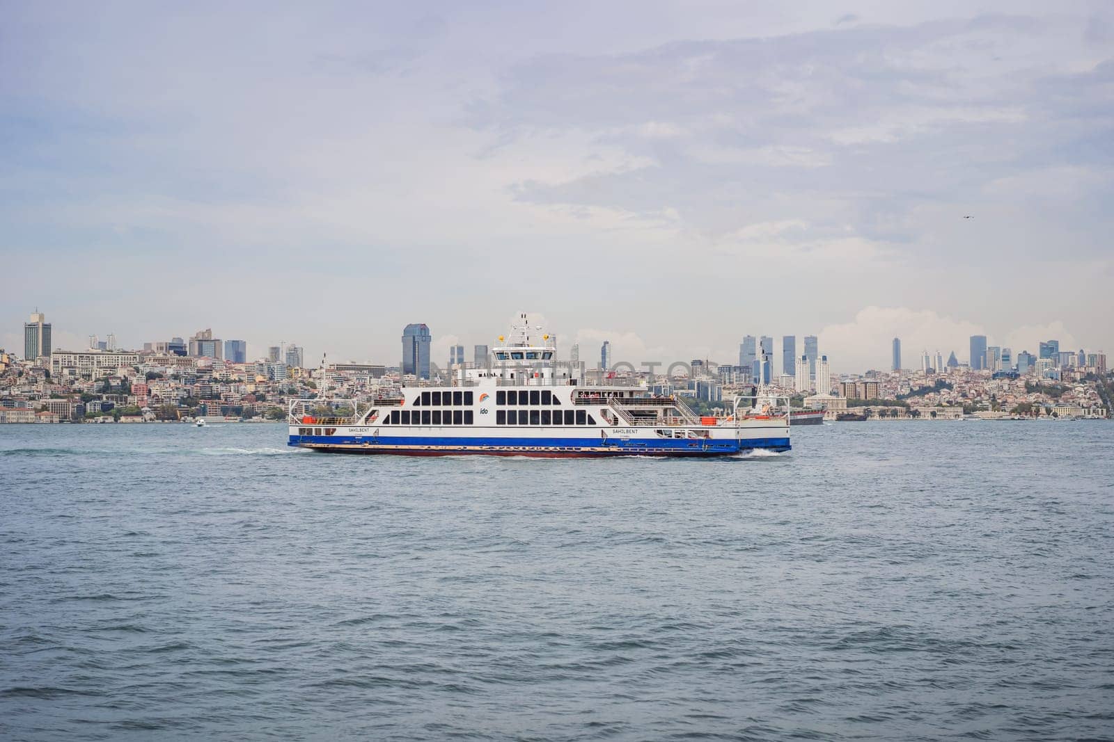 Istanbul, Turkey August 13, 2022: Muslim architecture and water transport in Turkey - Beautiful View touristic landmarks from sea voyage on Bosphorus by galitskaya