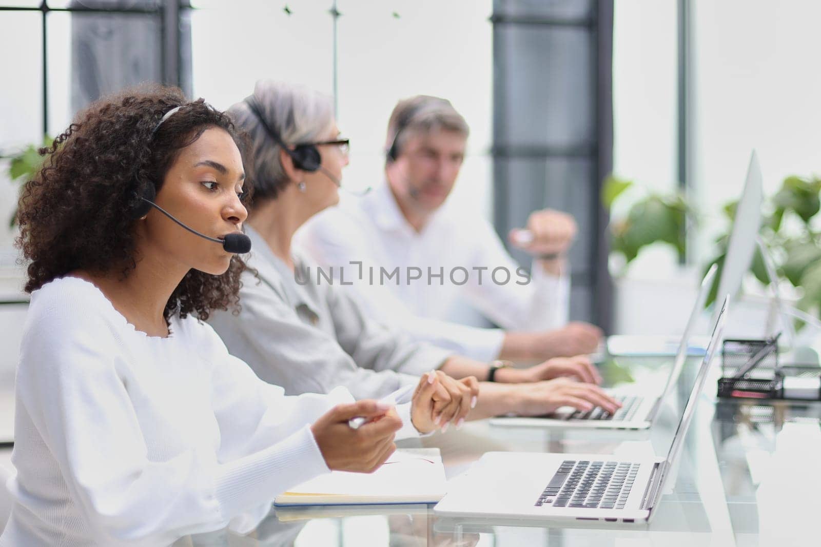 Business group working in customer and help desk office.