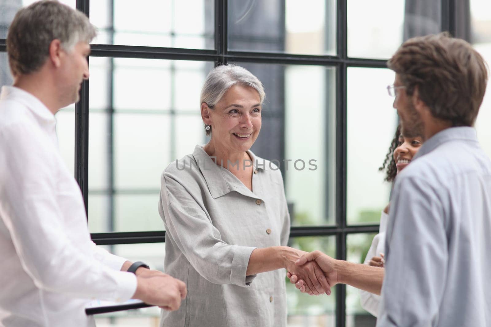 Conversation between managers and employees in the office.