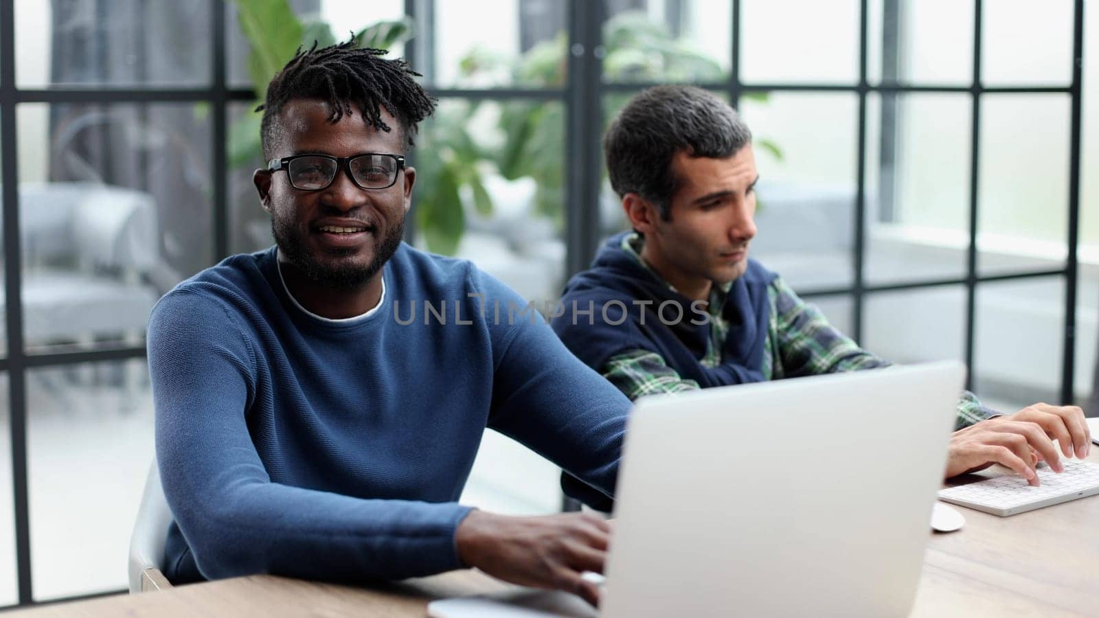 african white colleagues working together use pc corporate apps, mentor teach new employee, internship and teamwork concept