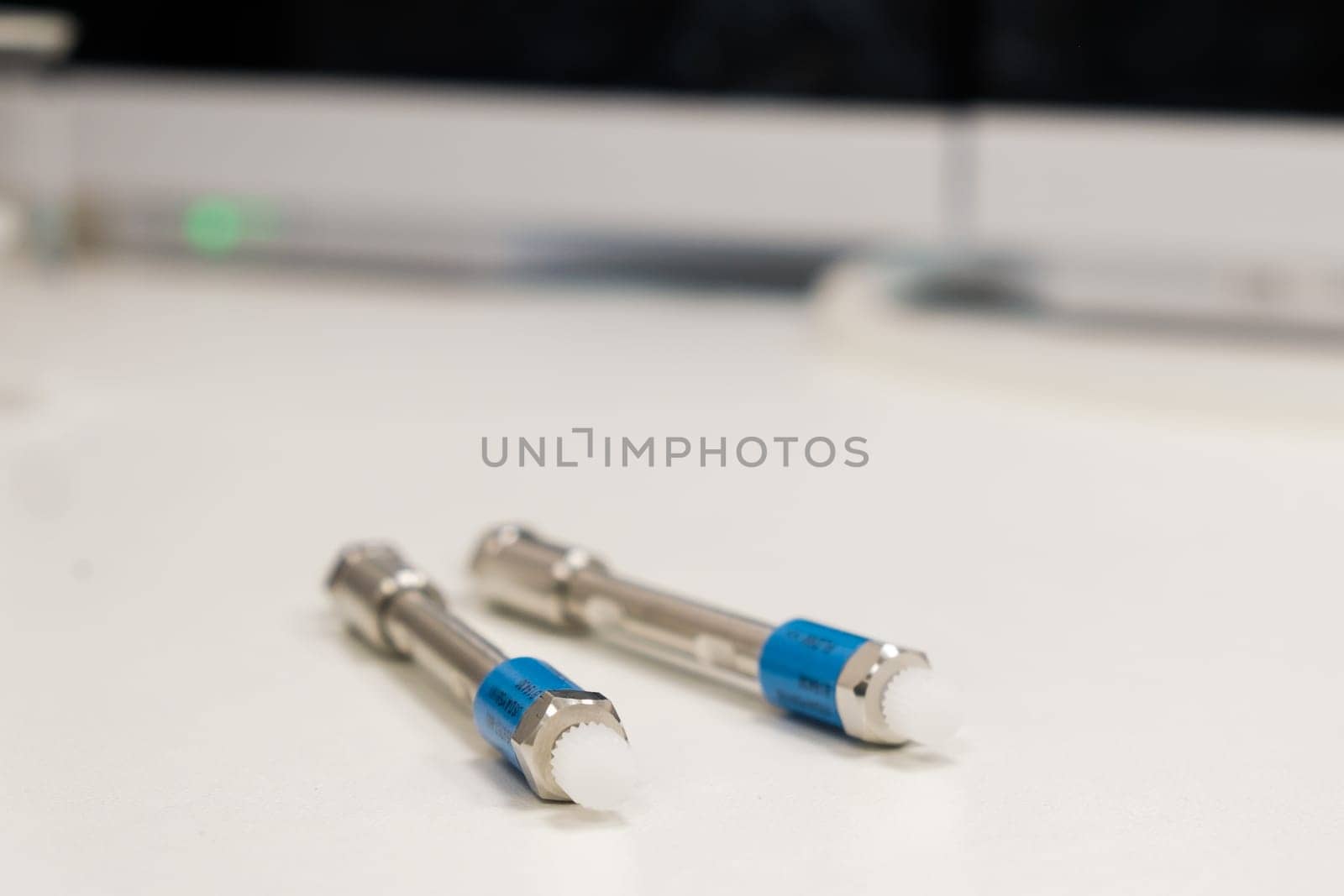 HPLC 50 mm columns on the table in the laboratory. Fast high performance liquid chromatography analysis in a chemical and microbiological laboratory. Clinical, toxicological and forensic analysis.