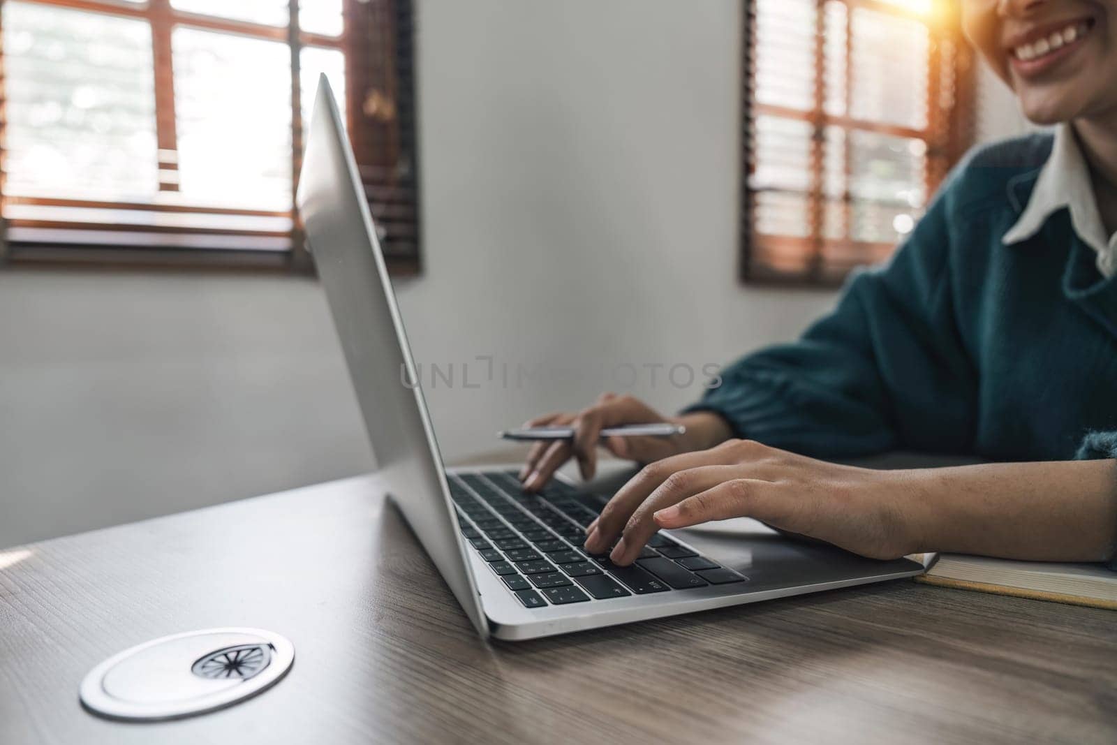 Female hands working on a laptop, close up. Technology, Freelance, online course, remote work, internet concept by nateemee