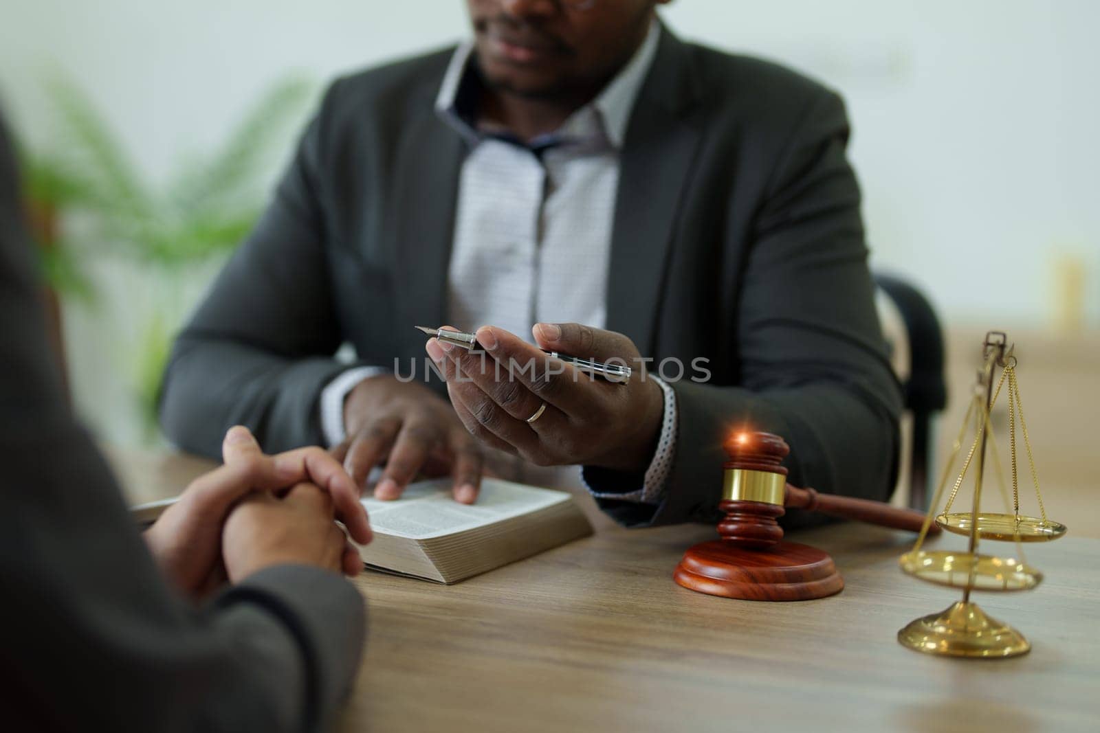 african american attorney, lawyers discussing contract or business agreement at law firm office, Business people making deal document legal, justice advice service concepts by Manastrong