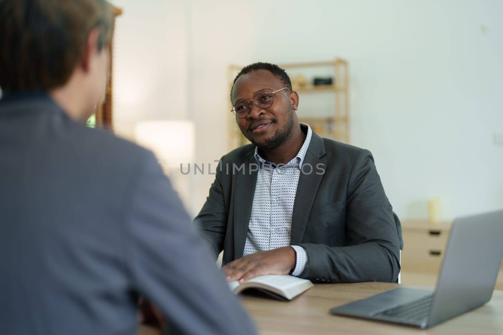 african american attorney, lawyers discussing contract or business agreement at law firm office, Business people making deal document legal, justice advice service concepts.