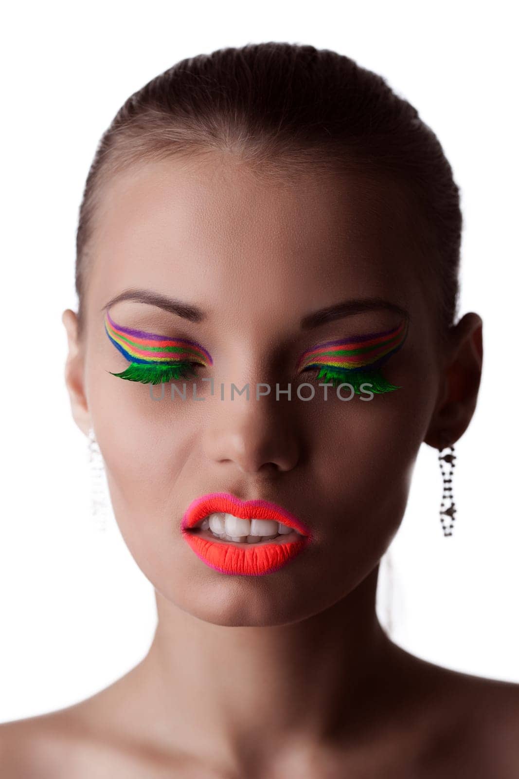Face of beautiful girl with bright UV makeup, close-up