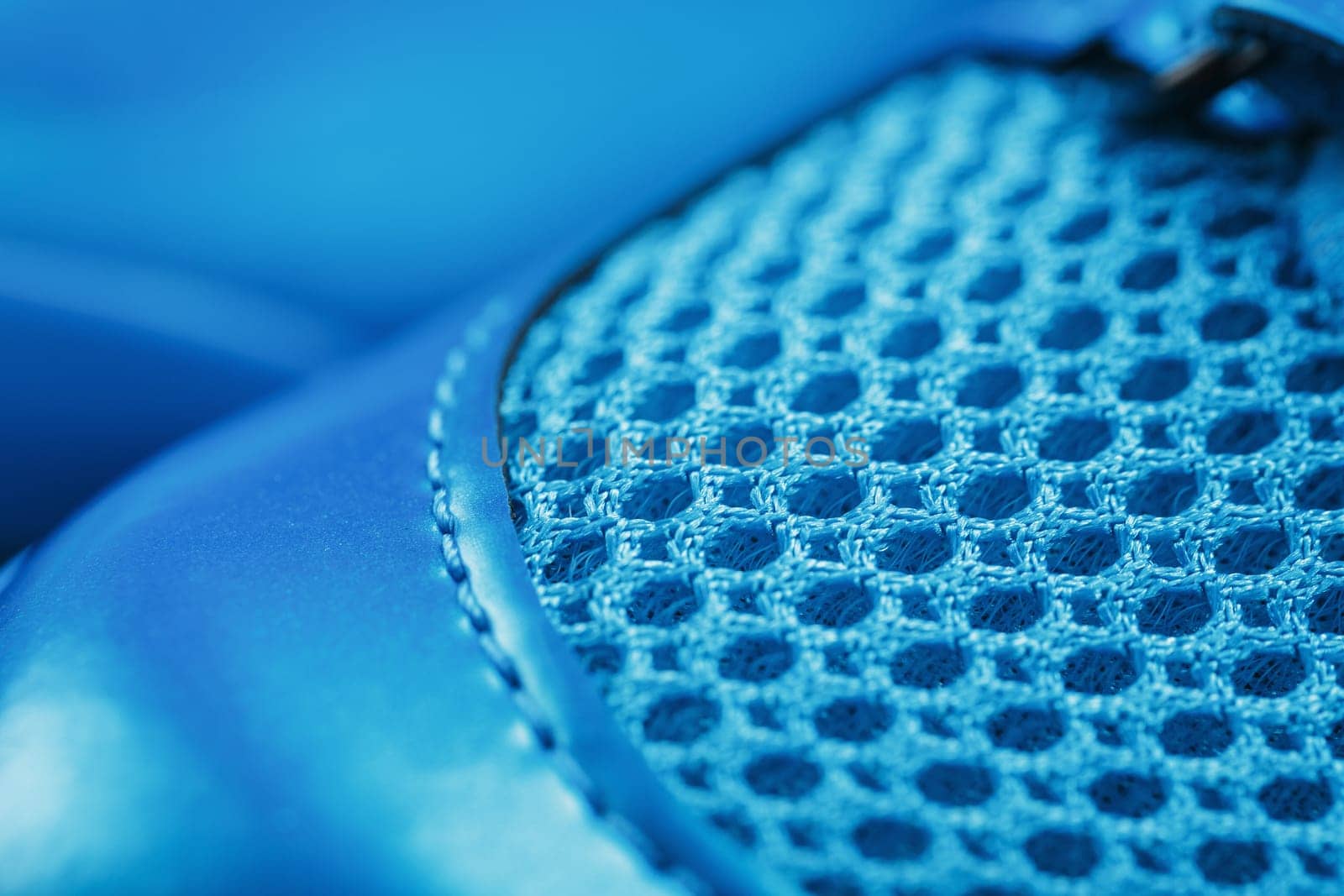 Macro Ventilation grid of blue sneakers in full screen by AlexGrec