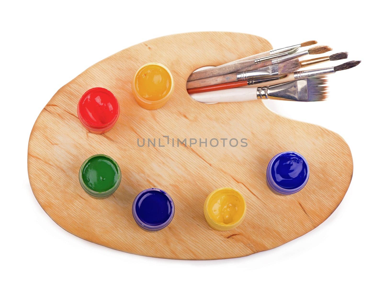 Wooden art palette with paints and brushes for the artist, unused painting brushes and palette isolated on white background by aprilphoto