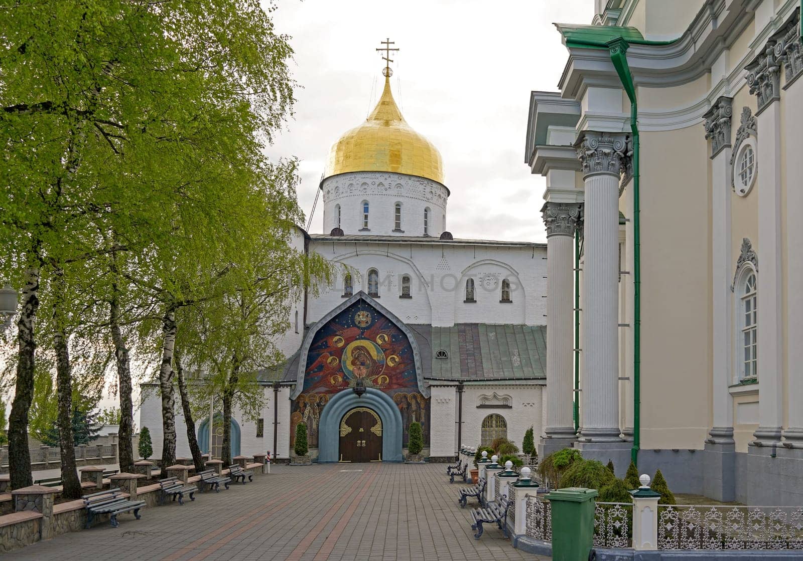 Early morning in the Pochaev Lavra, Ukraine. May 2021. view of the Assumption Cathedral and various buildings and architectural structures by aprilphoto