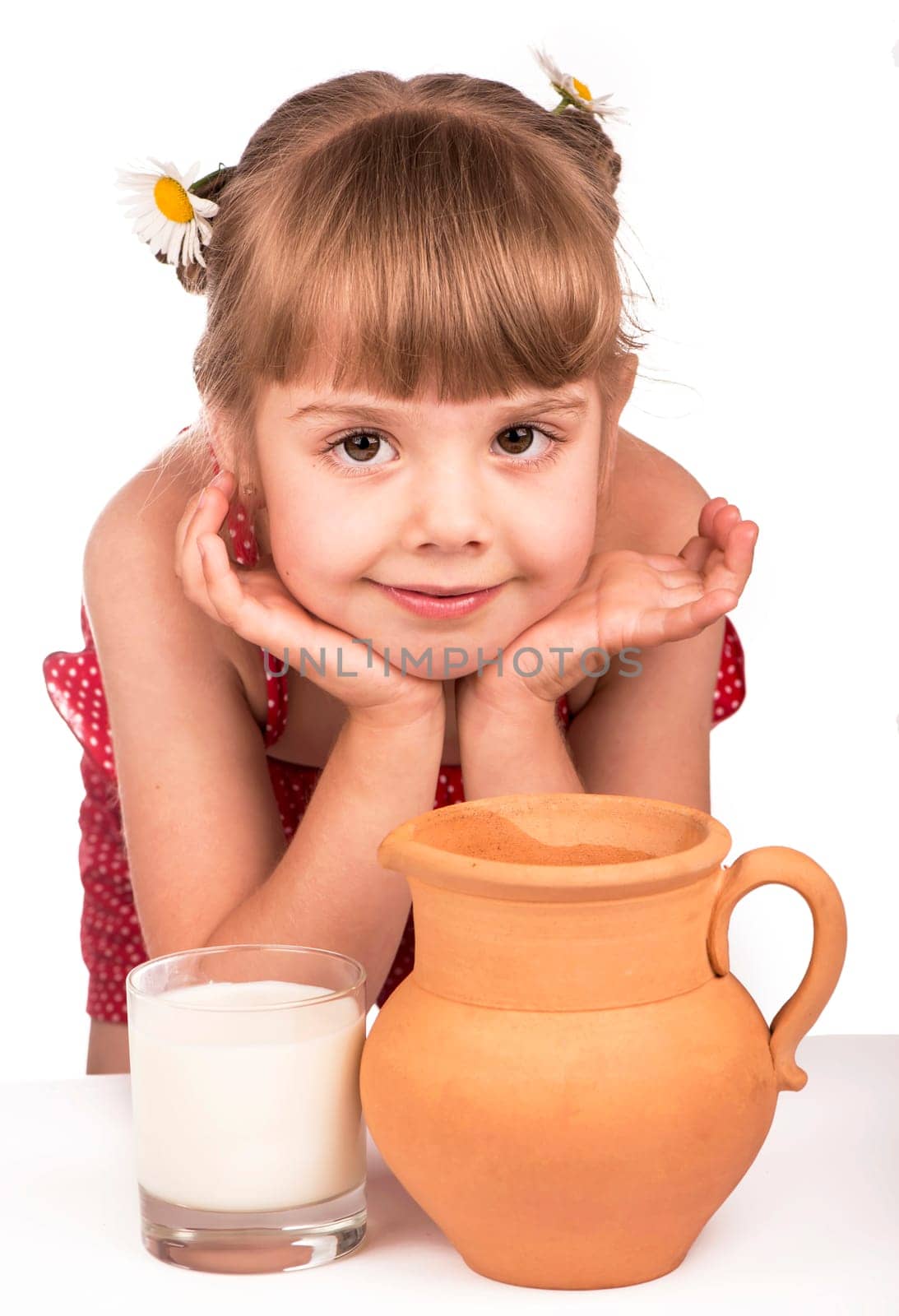 Little girl and milk. Little cute girl holding clay jug with milk isolated on the white background by aprilphoto