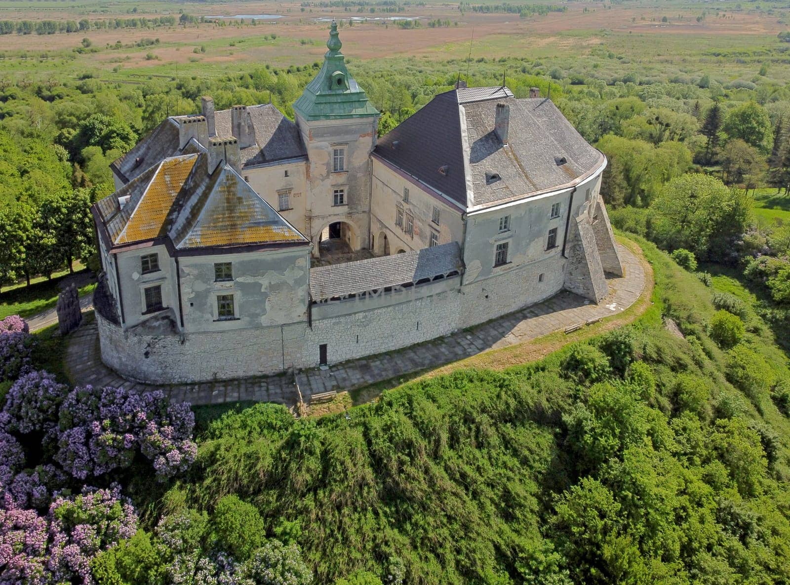 History of Ukraine. Tourism. Aerial view of the Olesky Castle. Very beautiful castle near Lviv. by aprilphoto