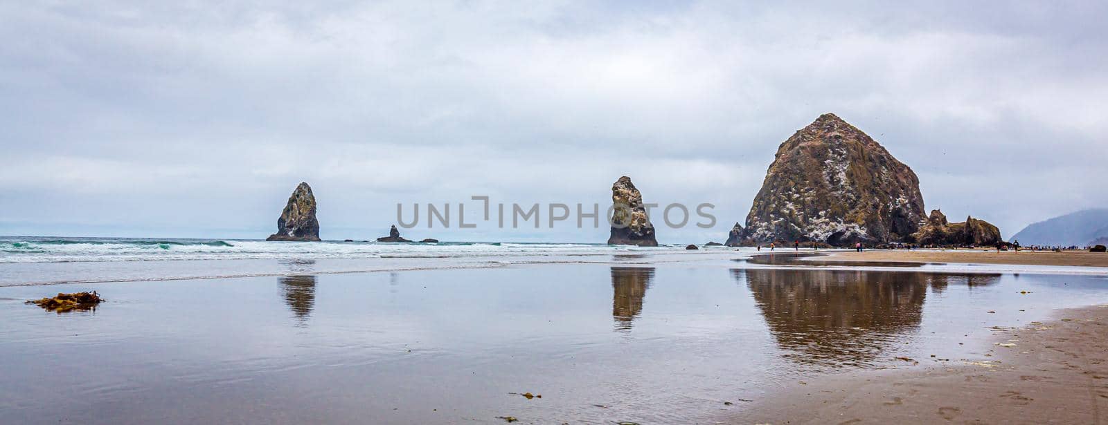 Haystack Rock and The Needles at low tide, Cannon Beach, Oregon