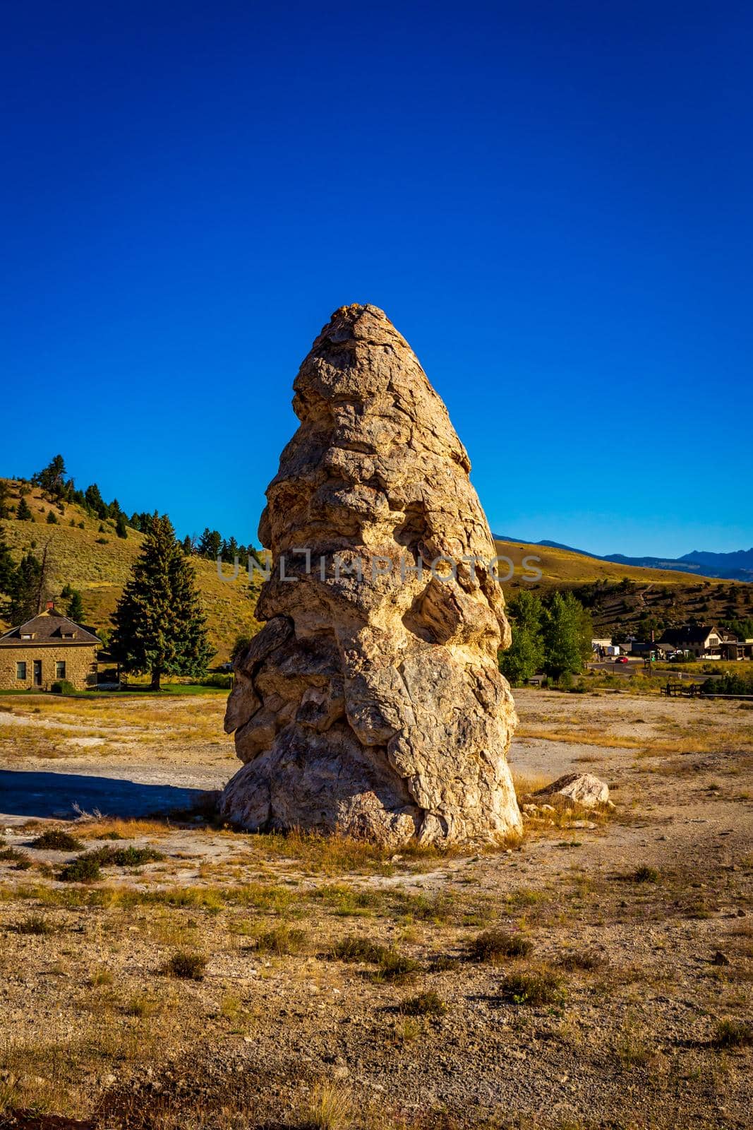Liberty Cap is a dormant, 37-foot high hot spring cone in Mammoth Hot Springs, Yellowstone National Park