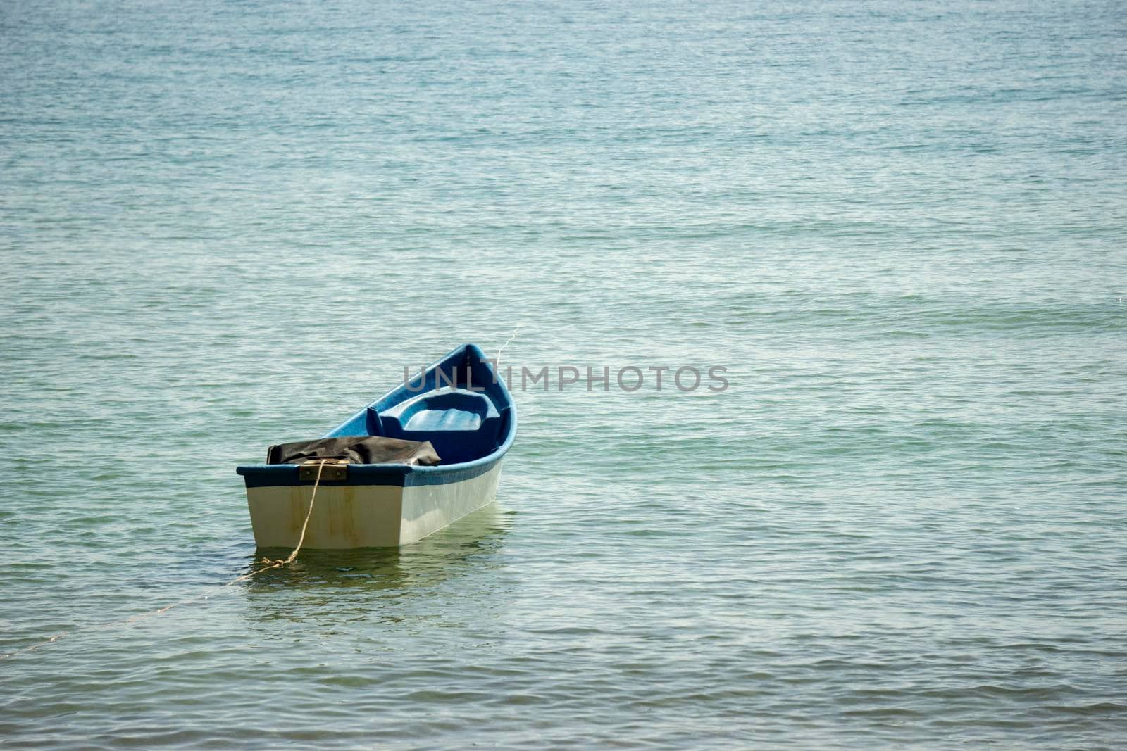 Small boats park by the sea. Small boats near the beach. Sandy beach at Sairee Beach, Chumphon Province