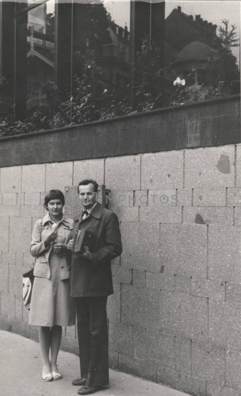 Vintage photo shows a mature couple. Retro black and white photography. Circa 1980. by roman_nerud