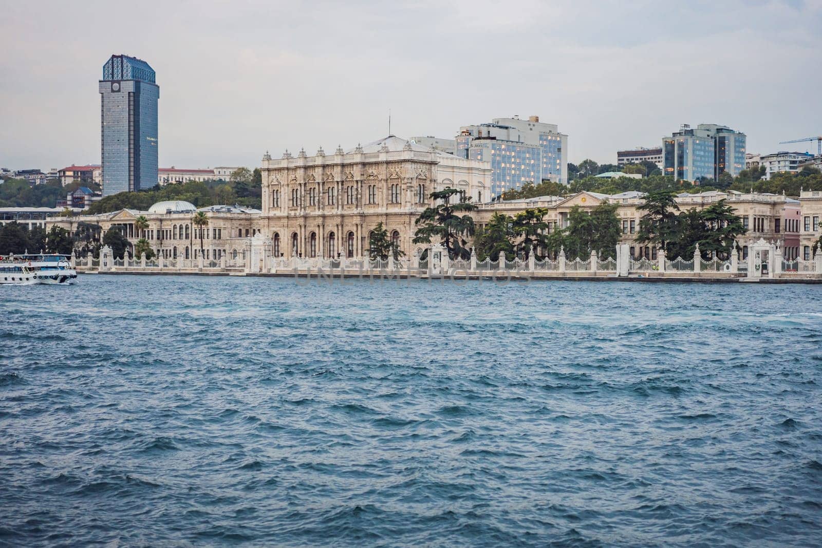landscape scenery of Dolmabahce palacewith reflection, istanbul, turkey waterfront view from bosporus by galitskaya