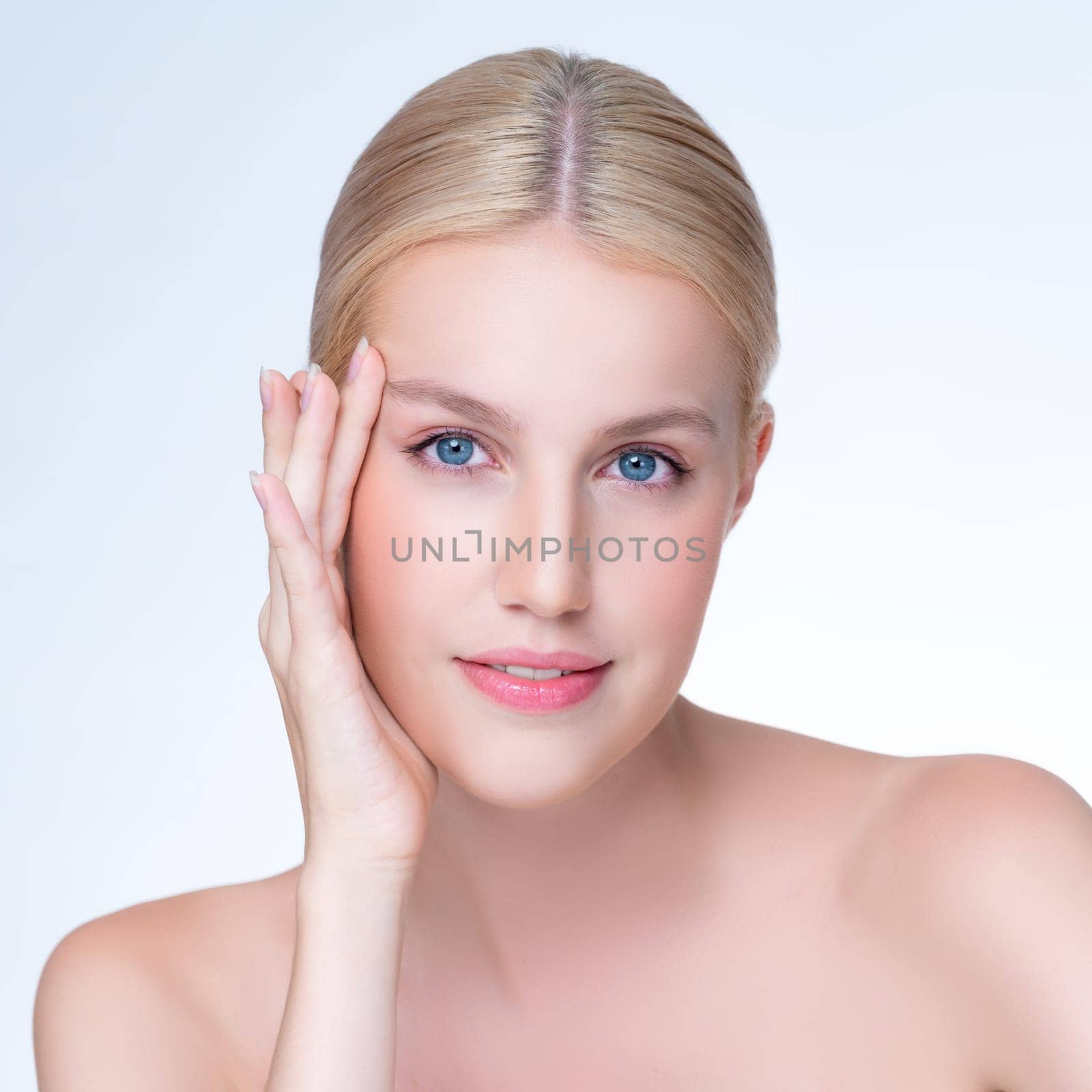 Closeup personable beautiful woman portrait with perfect smooth clean skin and natural makeup portrait in isolated background. Hand gesture with expressive facial expression for beauty model concept.