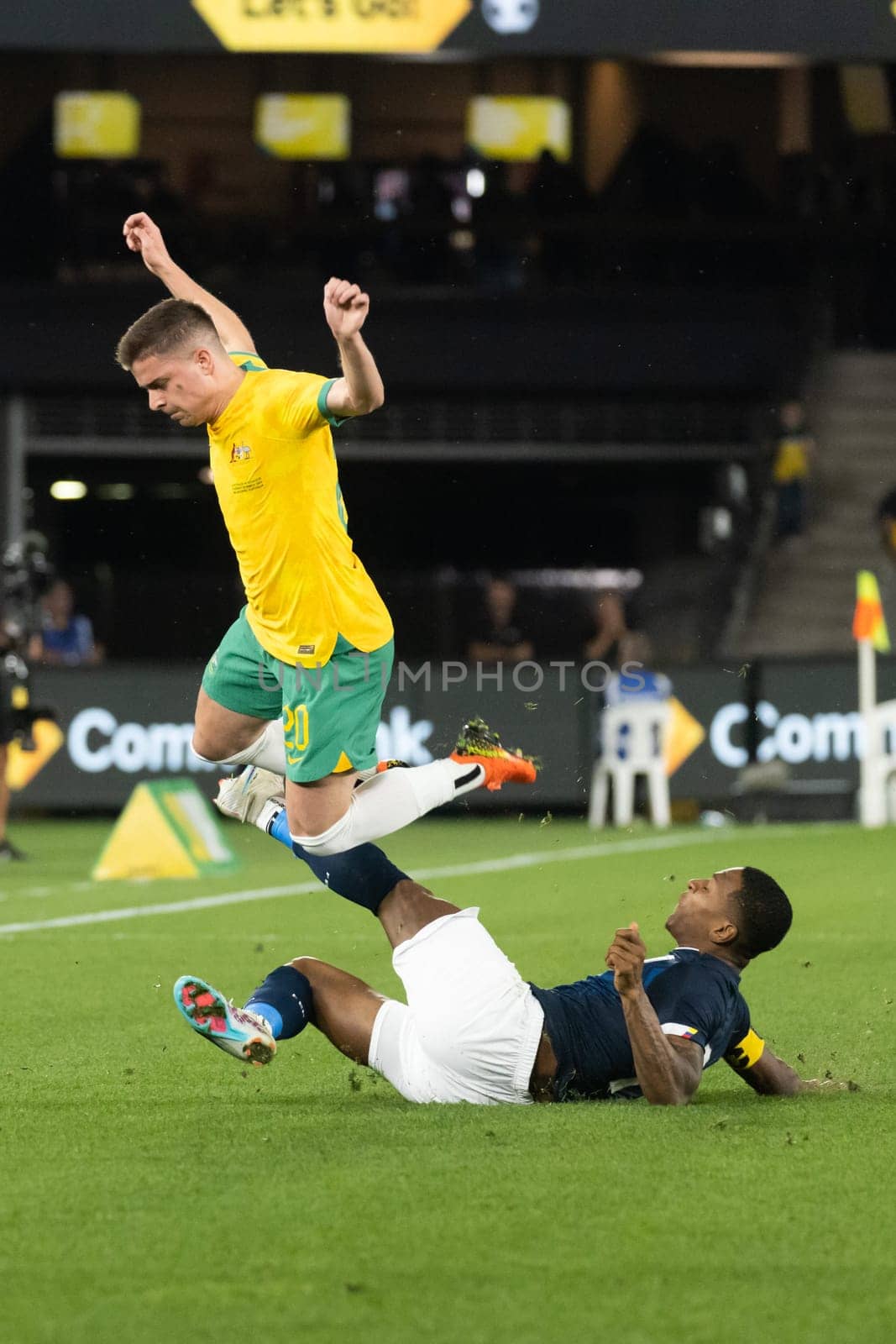 MELBOURNE, AUSTRALIA - MARCH 28: Pervis Estupiñán of Ecudaor battles with Cameron Devlin of Australia during an international friendly match between the Australia Socceroos and Ecuador at Marvel Stadium on March 28, 2023 in Melbourne, Australia.