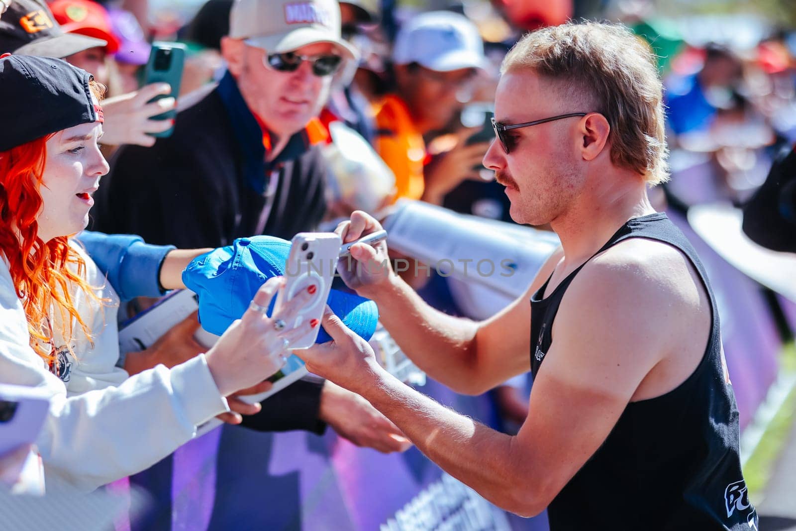 MELBOURNE, AUSTRALIA - MARCH 30: Valtteri Bottas of Finland meets fans at the 2023 Australian Formula 1 Grand Prix on 30th March 2023