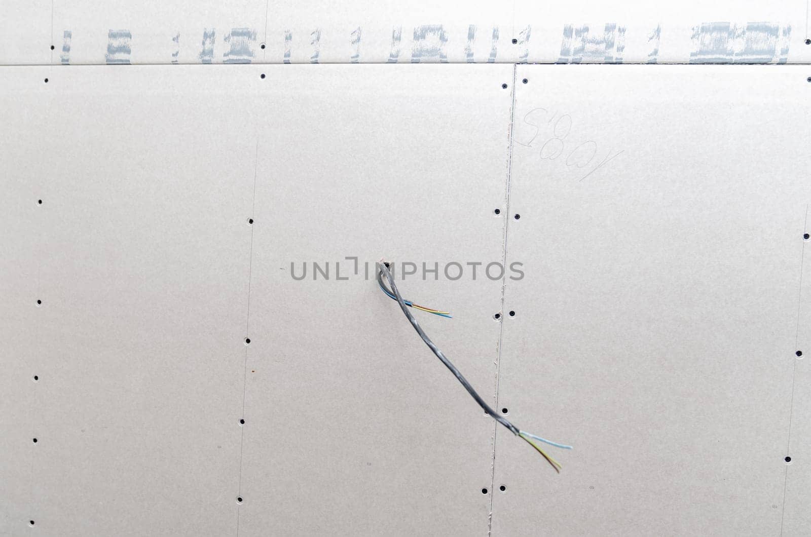 electrical wires in the wall at the construction site. High quality photo