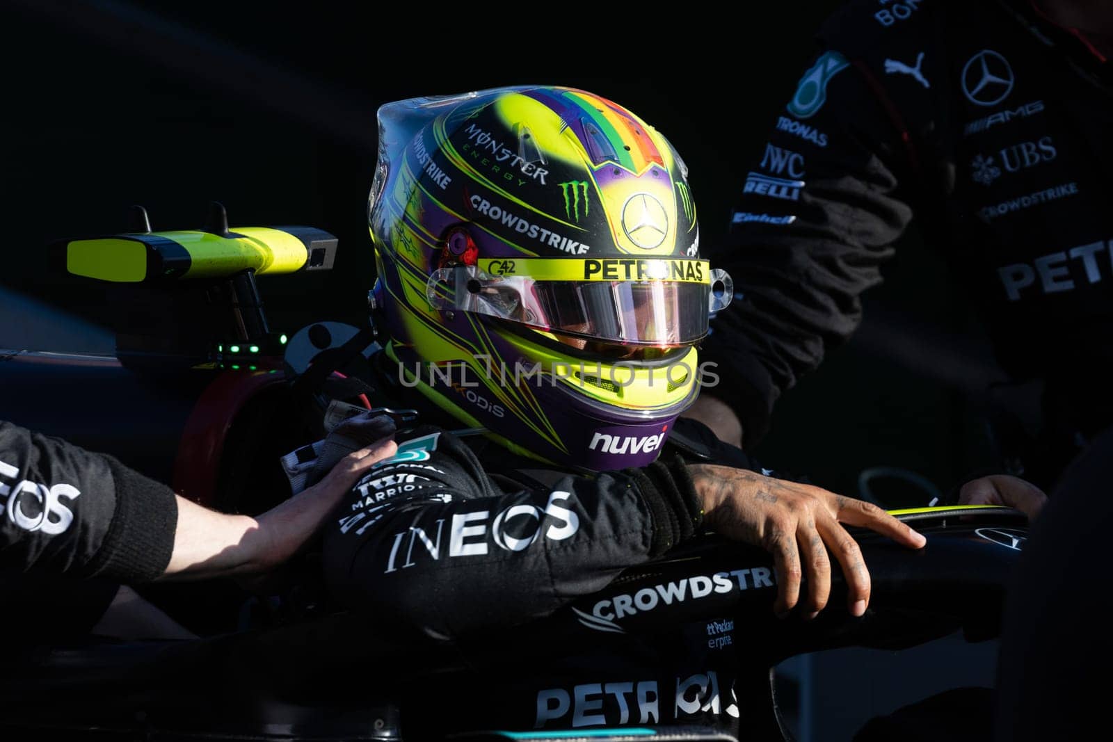 MELBOURNE, AUSTRALIA - APRIL 2: Lewis Hamilton of Great Britain of Mercedes AMG Petronas F1 Team climbs out of his car at a restart on race day during the 2023 Australian Grand Prix on April 2, 2023 in Melbourne, Australia.