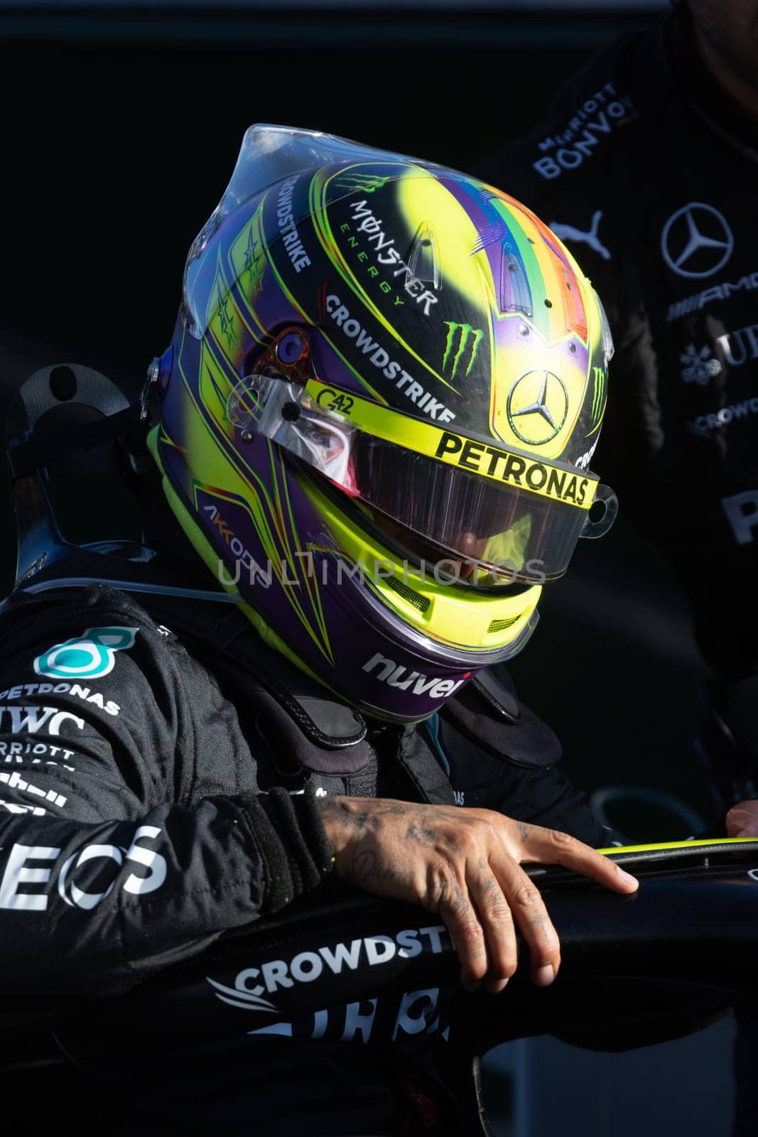 MELBOURNE, AUSTRALIA - APRIL 2: Lewis Hamilton of Great Britain of Mercedes AMG Petronas F1 Team climbs out of his car at a restart on race day during the 2023 Australian Grand Prix on April 2, 2023 in Melbourne, Australia.