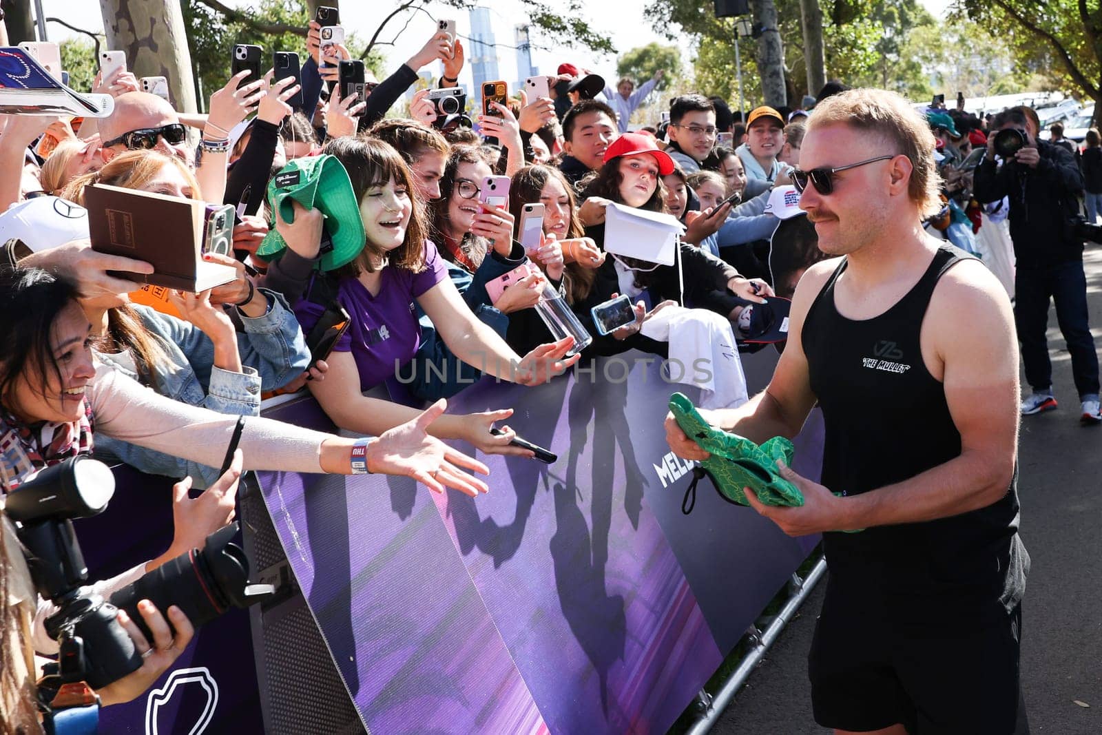 MELBOURNE, AUSTRALIA - MARCH 30: Valtteri Bottas of Finland meets fans at the 2023 Australian Formula 1 Grand Prix on 30th March 2023