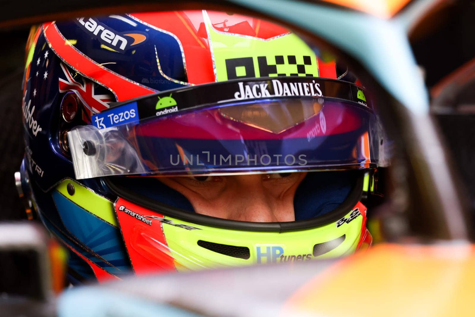 MELBOURNE, AUSTRALIA - MARCH 31: Oscar Piastri of Australia gets into the McLaren MCL36 during practice in the 2023 Australian Grand Prix at Albert Park in Melbourne, Australia