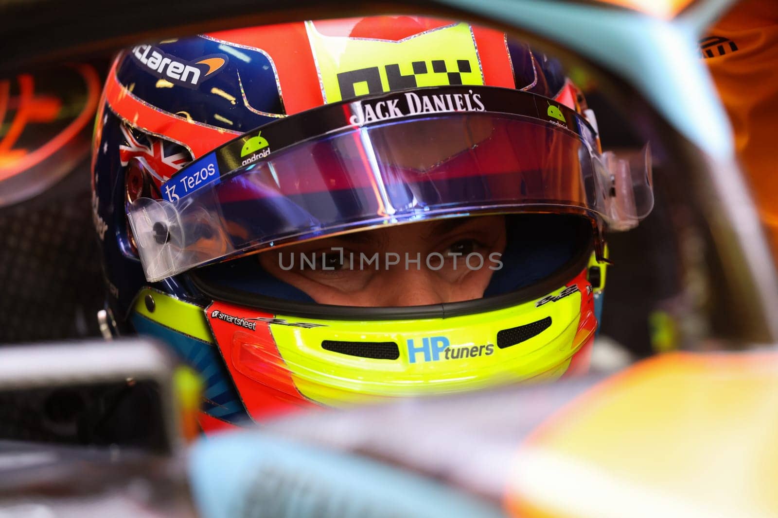 MELBOURNE, AUSTRALIA - MARCH 31: Oscar Piastri of Australia gets into the McLaren MCL36 during practice in the 2023 Australian Grand Prix at Albert Park in Melbourne, Australia