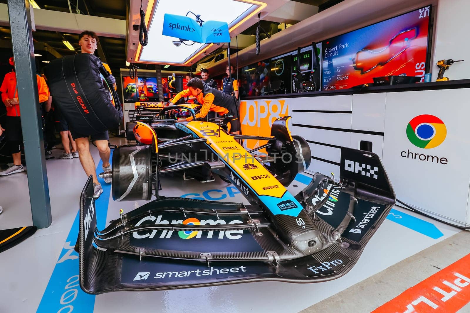 MELBOURNE, AUSTRALIA - MARCH 31: Oscar Piastri of Australia gets into the McLaren MCL36 during practice in the 2023 Australian Grand Prix at Albert Park in Melbourne, Australia