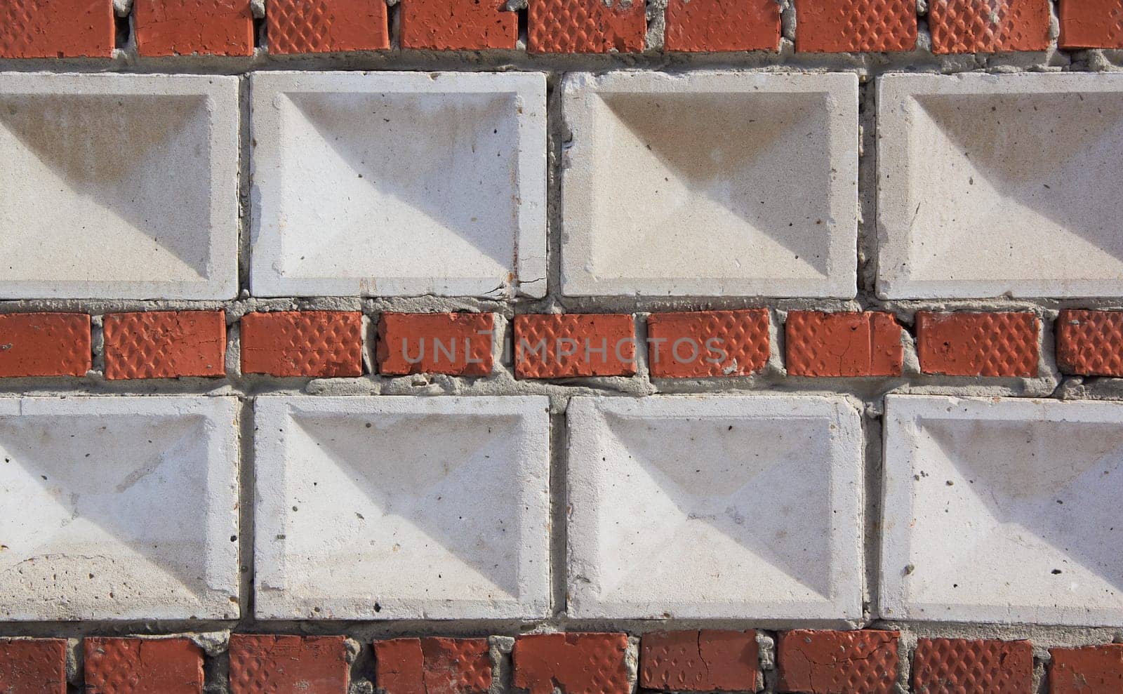 Textured design using decorative tiles and bricks by Севостьянов