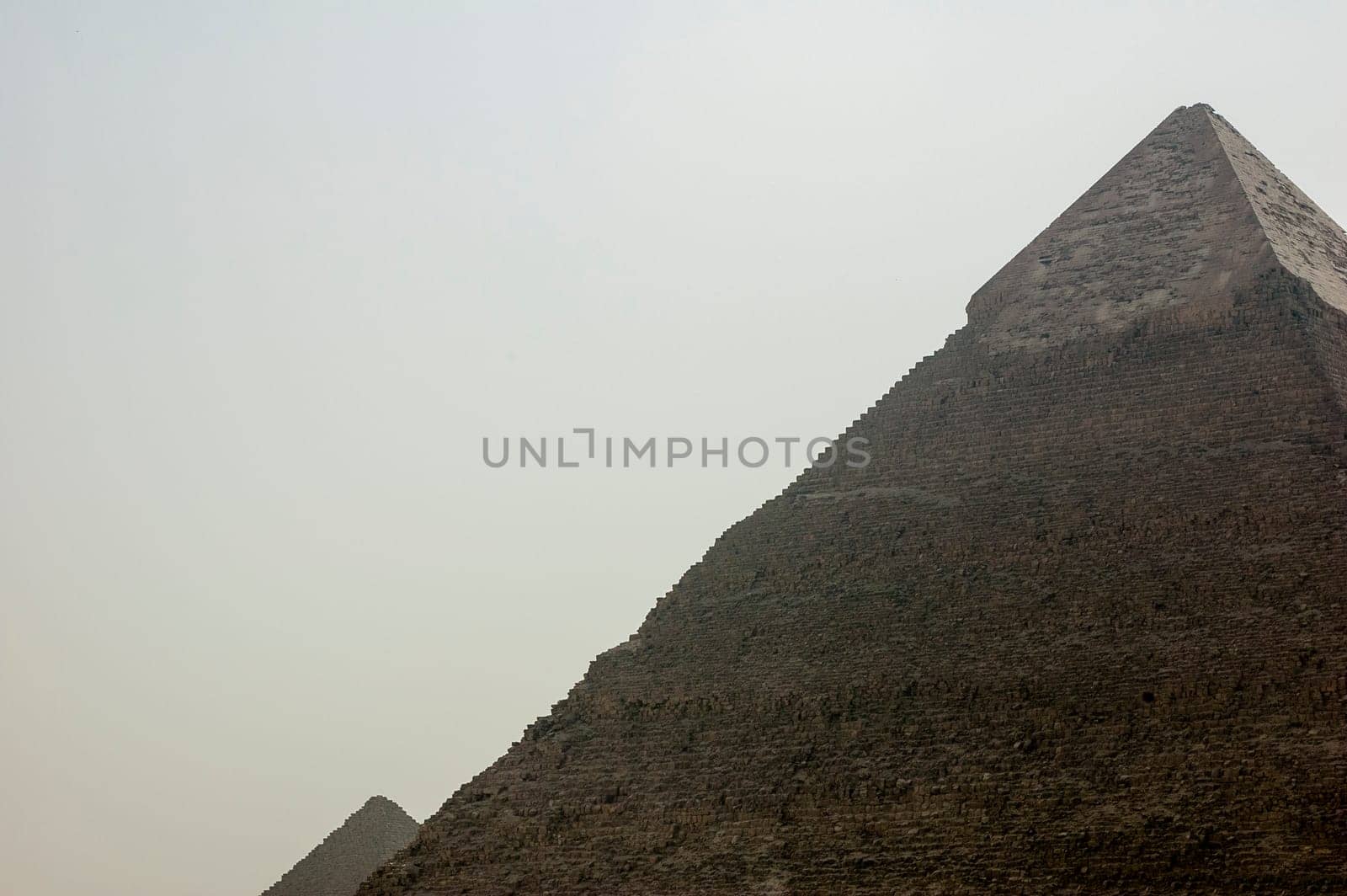 Giza, Egypt - April 13 2008: The Pyramid of Khafre or Chephren in the archeological site of Giza. Egypt.