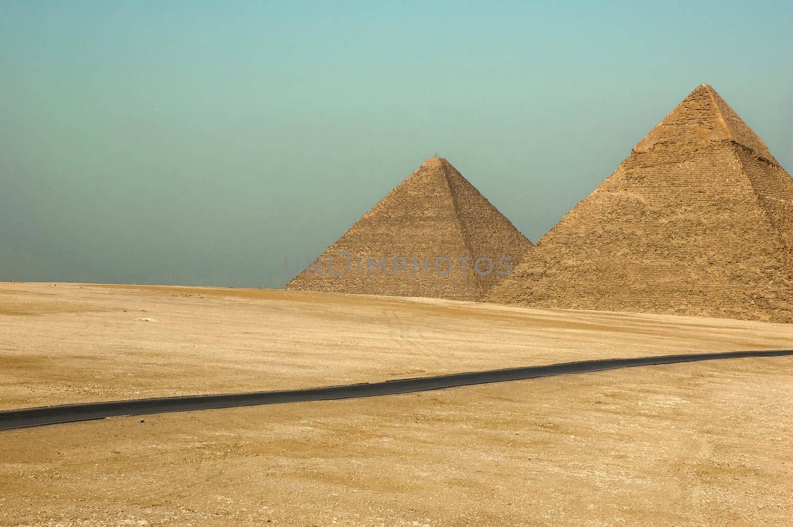 Giza, Egypt - April 13 2008: The pyramids (Cheops and Khafre) in the archeological site of Giza. Egypt.