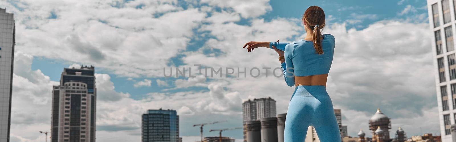 Beautiful fit young woman jogger is running outdoors by Yaroslav_astakhov