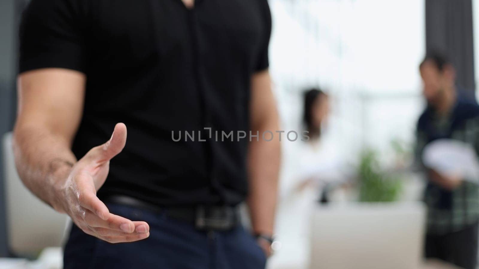 business man offering handshake in office acquisition concept.