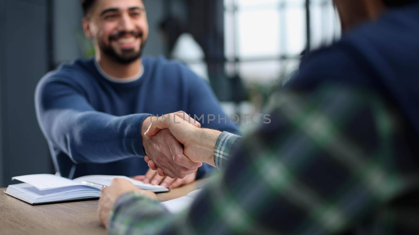 Businessmen Handshaking join to form a startup,