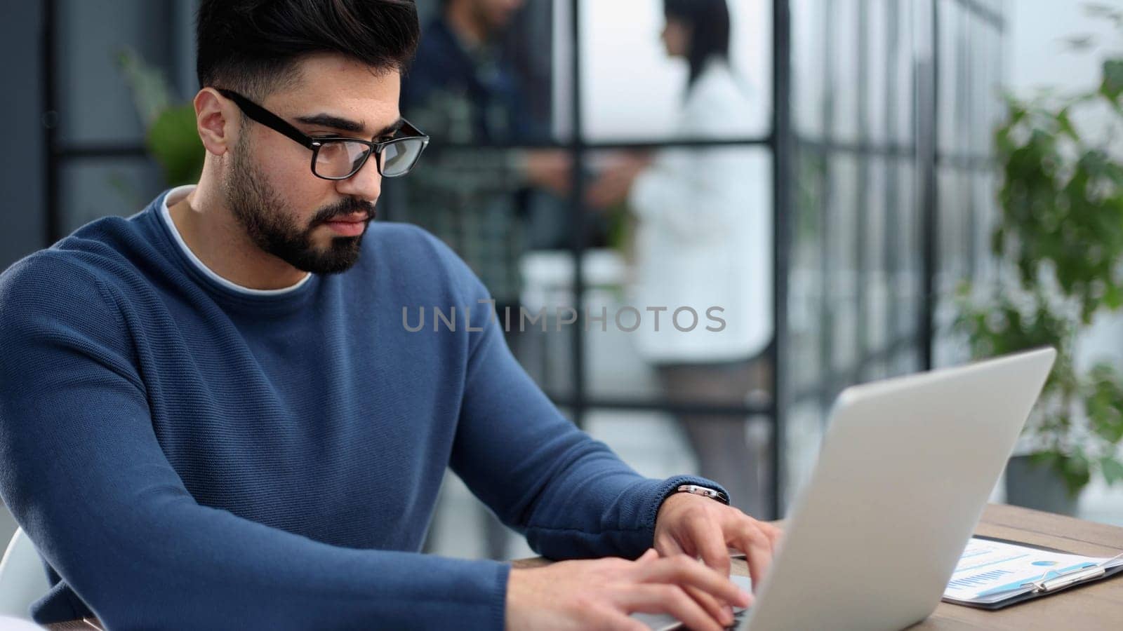 Businessman working on a laptop computer in the office