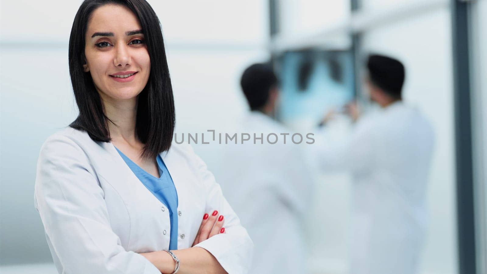 Portrait of a pensive woman doctor in a hospital corridor
