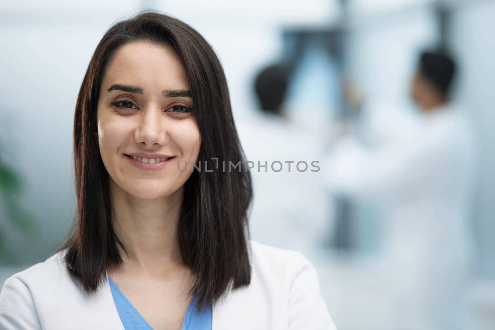 Portrait of a friendly physician woman. Perfect medical service in a hospital. Medicine concept