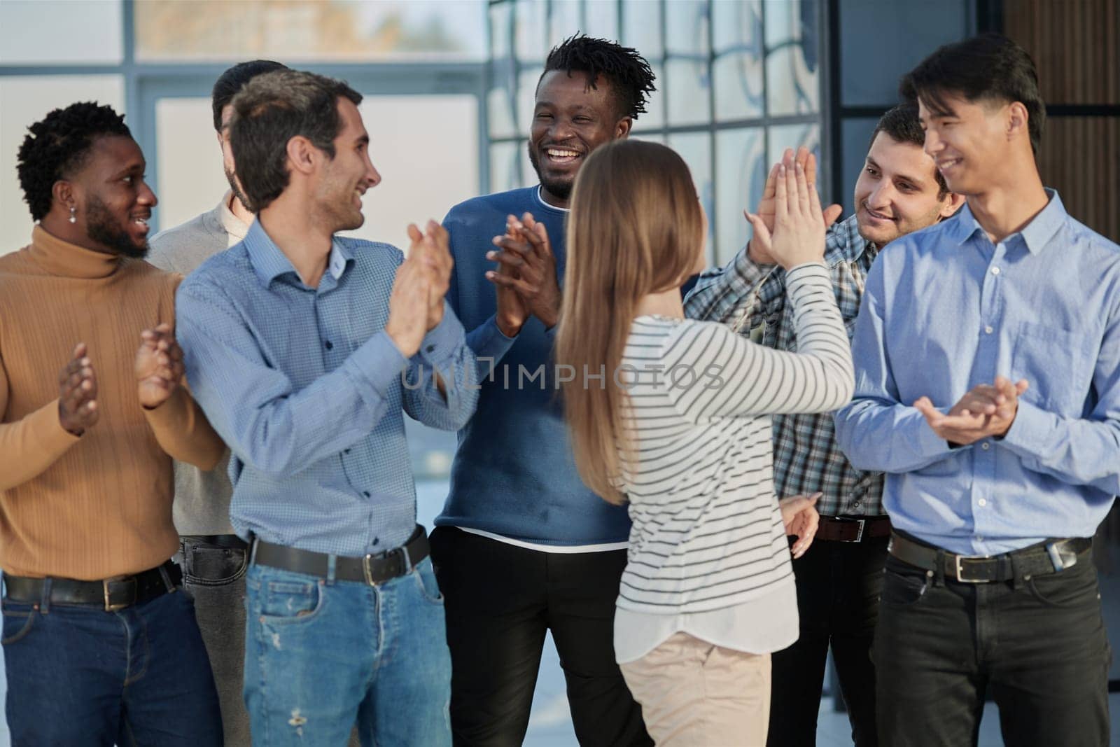 Concept of team work, internationality and success.
