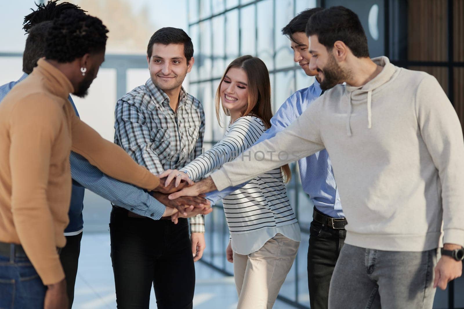 Business professionals welcome a new participant to the seminar