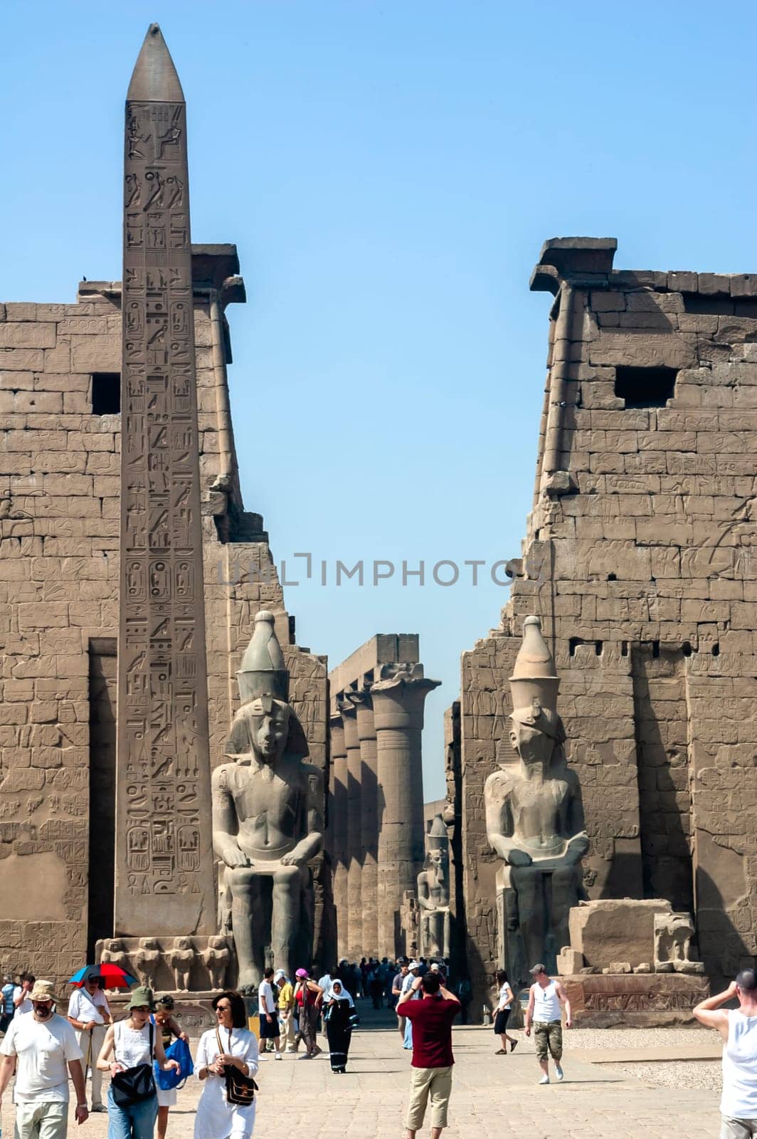Luxor, Egypt - April 15 2008: Tourists visiting the temple of Amun in Karnak, Luxor, Egypt